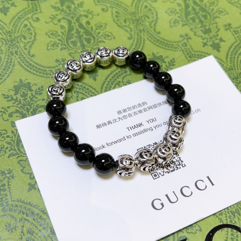 G*u*i bracelets